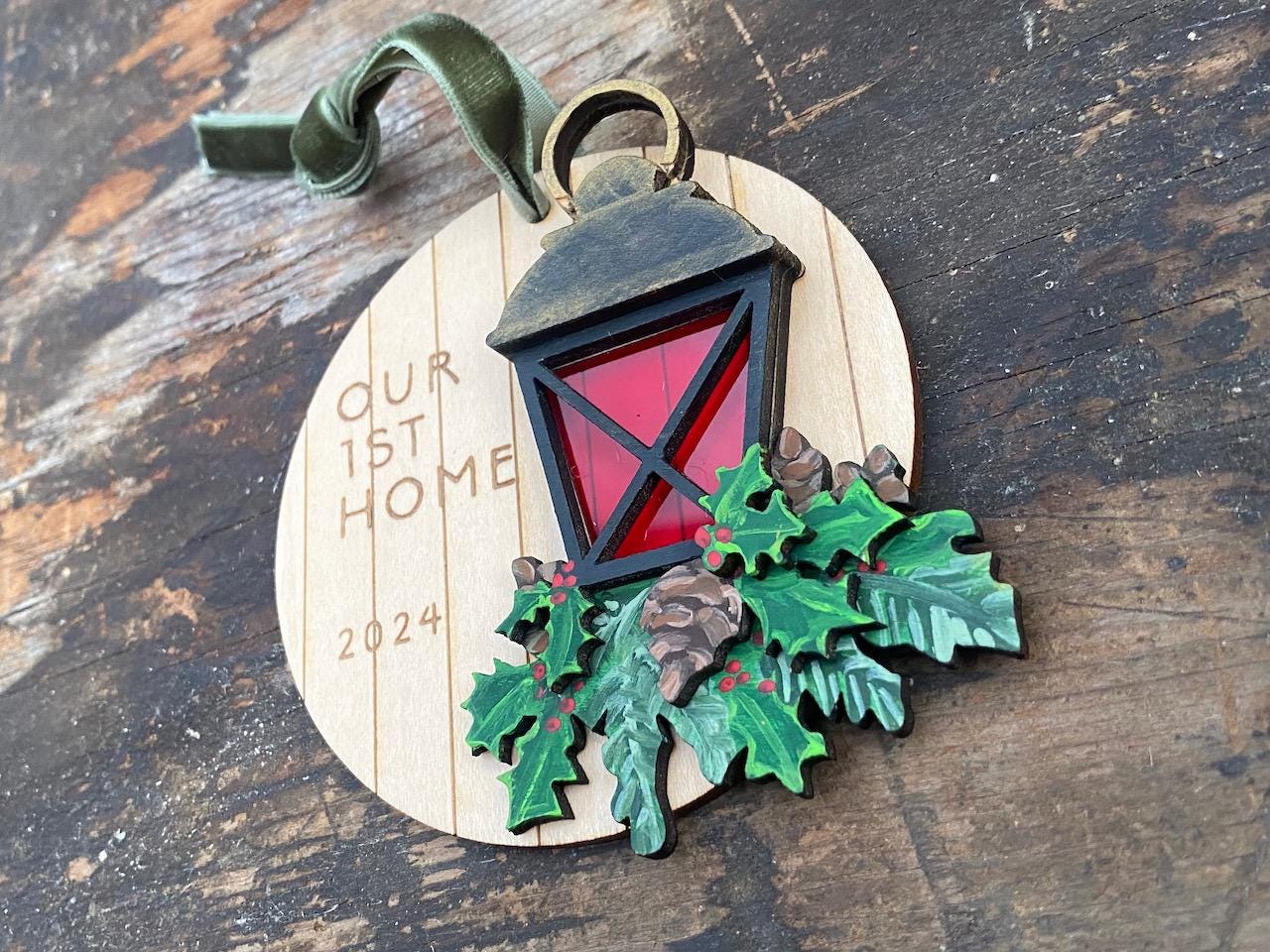 Christmas Lantern on Boughs of Evergreens and Pinecones