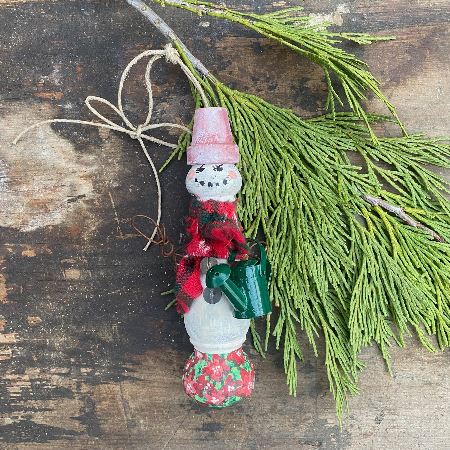 Upcycled Garden Snowmen Ornaments Made from Architectural Salvage