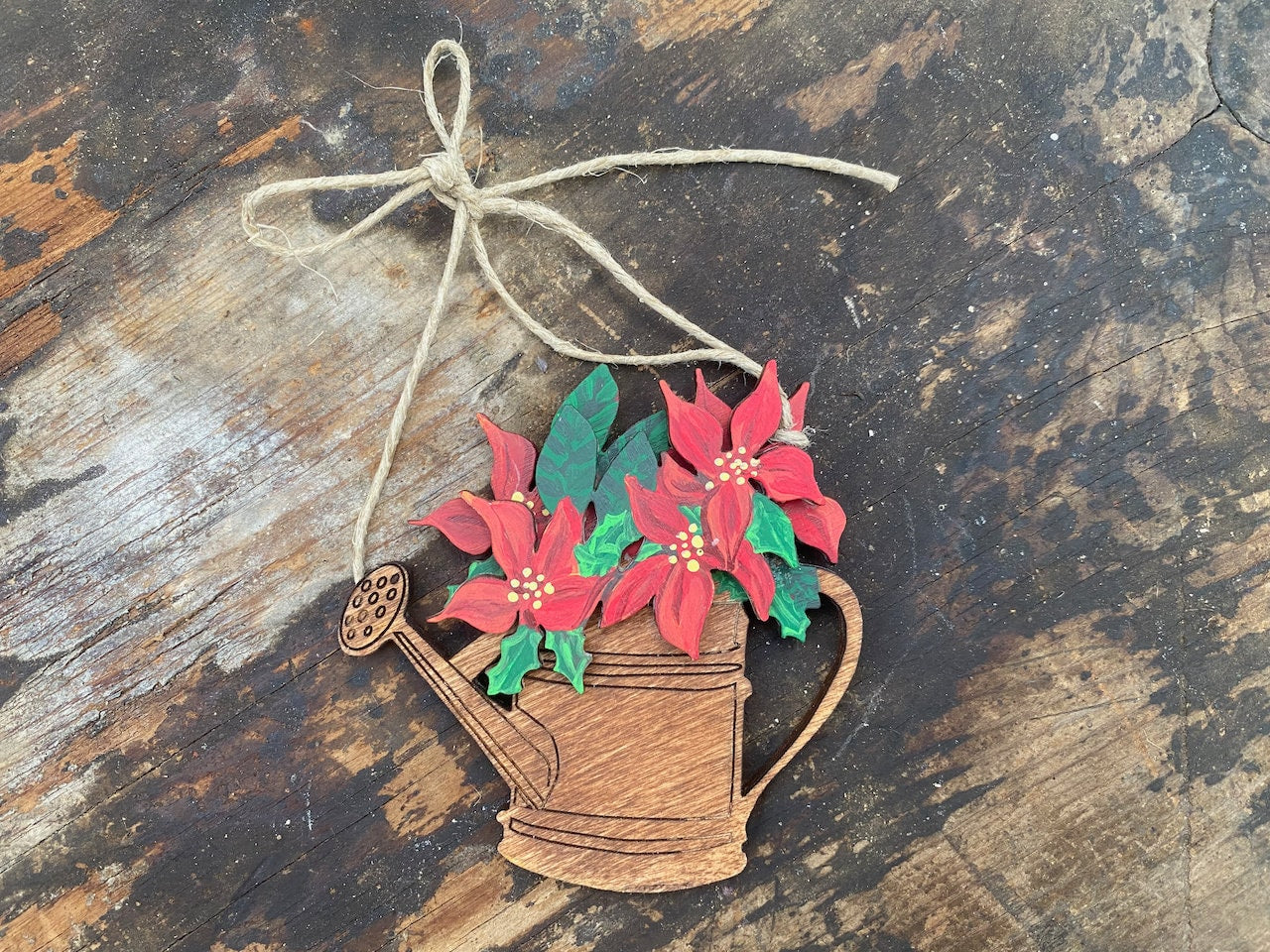 Vintage Watering Can with Pointsettia Ornament for Garden Lovers