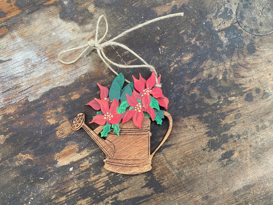 Vintage Watering Can with Pointsettia Ornament for Garden Lovers